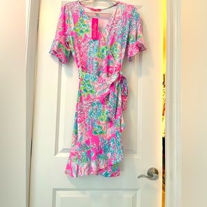 Gorgeous Lilly Putzlier dress, size small with ruffled sleeves it’s stunning!!